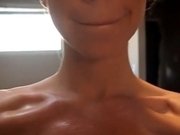 Brunette college girl shakes her huge tits on webcam