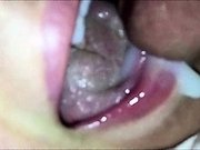 Ejaculating his semen on her tongue - CLOSEUP
